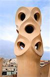 Abstract ventilation ducts atop the La Pedrera in Barcelona, Spain designed by famous architect Antonio Gaudi and built in 1912.