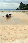 longtail boat on beach koh phi phi thailand