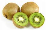 Close up of fresh kiwis on bright background