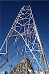 Construction of a high tension pole in the mountains