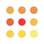 Nine shiny buttons (orbs) of glass in red, orange and yellow colours, isolated on white