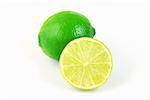 Fresh green lime full of vitamines isolated on light background