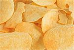 A lot of potato chips used as a background
