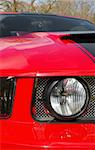 red and black vintage american muscle car close-up