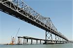 The San Francisco Bay Bridge, existing and new under construction spans