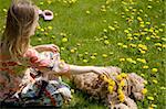 Young Hippie Woman With Dog