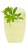 Punch with sweet woodruff herbs on bright background