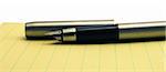 Fountain writing pen and yellow note pages