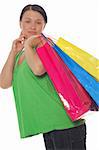 attractive woman with shopping bags on white background