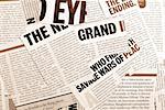 close up of newspaper headlines