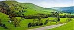 peak district landscape with fields and dry stone walls