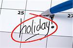 It is finally holiday! Marked and written holiday in a calendar.