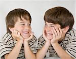 Two Little Boys Laughing Together