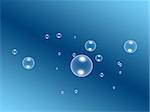 bubbles float on dark blue background