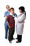 Medical personnel apply a cervical collar to  the neck of an injured boy