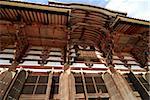 exterior details on the entrance to the biggest wooden building in the world - Todai-ji Temple in Nara, Japan; this building is 49 meters in height and is well-known as the Great Buddha hall