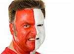Closeup portrait of an aggressive sports fan wearing face paint.