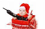 infant calling by phone in the decorated christmas box