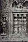 A carved wall of the Angkor temples in Siem Reap, Cambodia.