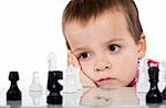 Boy playing chess - serious problem solving concept - isolated