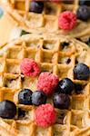 Raspberries and Blueberries on Breakfast Waffles