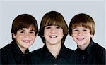 Portrait of Three Smiling Brothers Dressed in Black