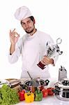 young chef with trophy on white background