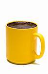 Yellow mug from coffee on a white background