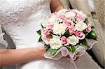 bouquet with orchids in the hands of the bride