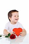 Happy boy with valentines or birthday present - isolated