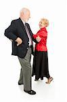 Happy senior couple having a great time square dancing.  Isolated on white.