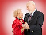Loving seniors couple out dancing on Valentines Day.