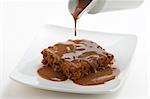 hot chocolate brownie with walnuts and vanilla isolated