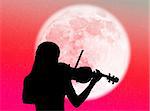 Musician playing violin in the moonlight and in the night