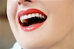 woman with white teeth and red lips laughing