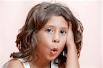 Studio portrait of  nice little girl having good time