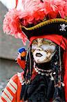 Carnival in venice with model dressed in various costumes and masks - pirate