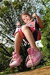 4 years old girl sitting on the swing