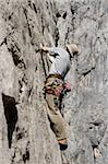 Man climbing a rock wall in paklenica national park