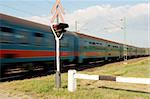 Passenger train passing by with motion blur