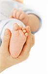 baby's foot in parent's hand