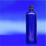 Aluminum water flask on blue background