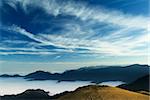 beautiful clouds fly over the grassland in high mountain.