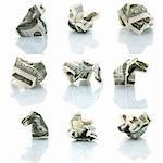 set of crushed one hundred dollar bills isolated on white