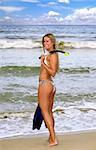 Beautiful Blonde Woman on the Beach With Snorkeling Gear in Hawaii