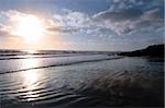 the waves with reflection crashing in on youghal beach ireland