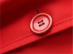 red clothes fragment with button