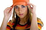 Beautiful young woman portrait with a orange hat. Isolated on white