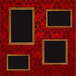 Four wooden picture frames with blank space for your own picture and red wallpaper design