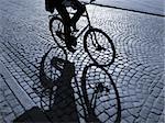 A warm spring afternoon a young man is biking through the old streets of Copenhagen, Denmark.